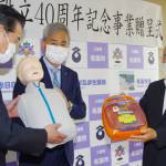 訓練用の人形とAEDを市に寄贈 名張市防火協会
