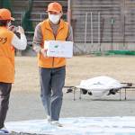 せんべい無事、空から届く ドローンで買い物代行 伊賀市で実験