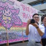 笑顔のモザイクアート制作へ イベント会場で写真撮影 名張市制70周年記念